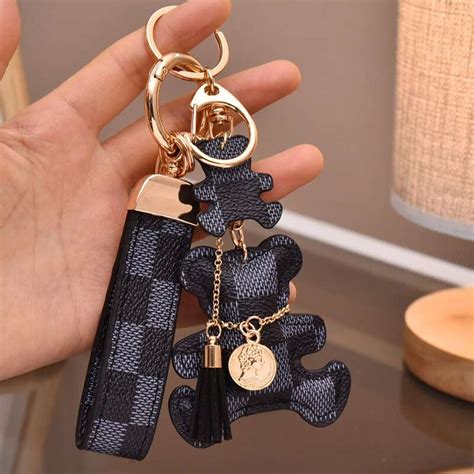 louis vuitton teddy bear keychain|louis vuitton pouch keychain.